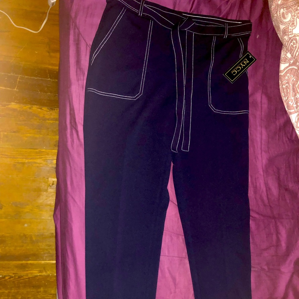 Navy blue slacks with white stitching, very light and comfortable